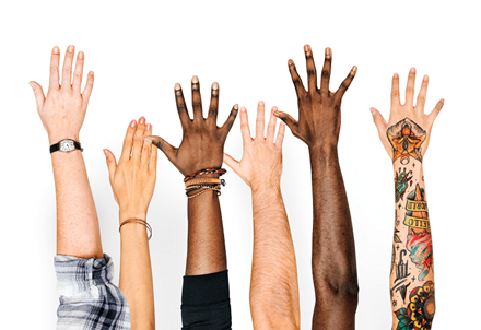 diverse group of hands raised in the air